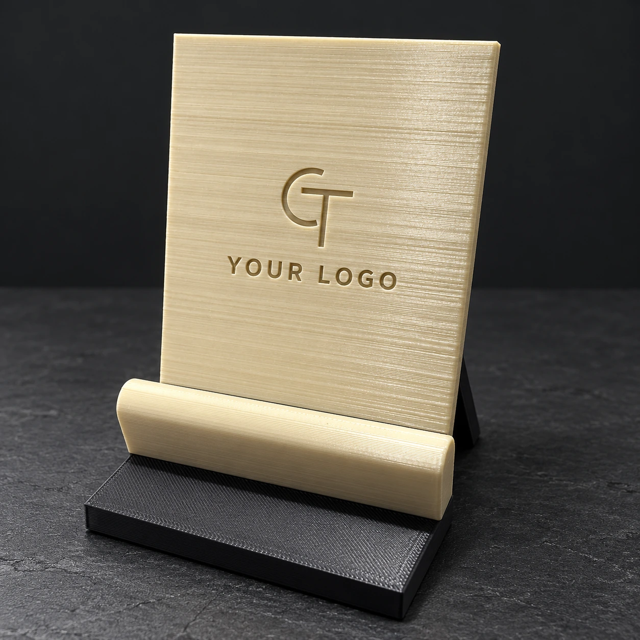 Cream-and-black phone stand with a broad back plate for a personalised logo or name