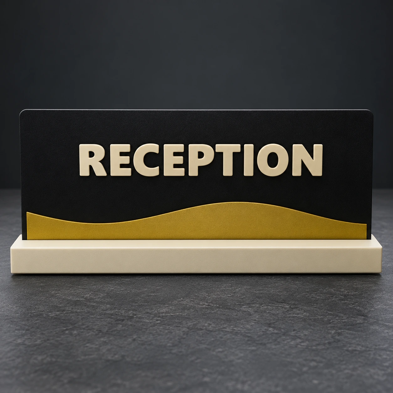 Freestanding reception desk sign with raised lettering, a gold accent and cream base